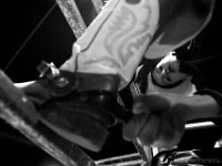 Derick Costa Jr., 10,  ties the spurs and tightens the chaps before his first ride at the final event in the New England Rodeo championship in Norton, MA.